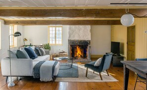 Smart TV, fireplace, foosball, books