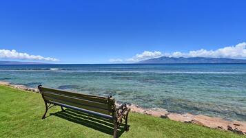 On the beach, sun loungers, beach towels