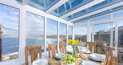 This property combines a breath-taking coastal location with modern styling