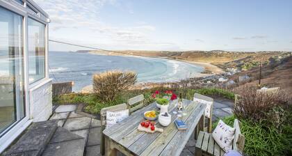 This property combines a breath-taking coastal location with modern styling