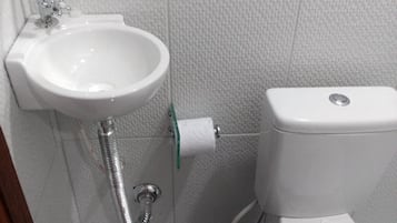 Shower, towels, soap, toilet paper