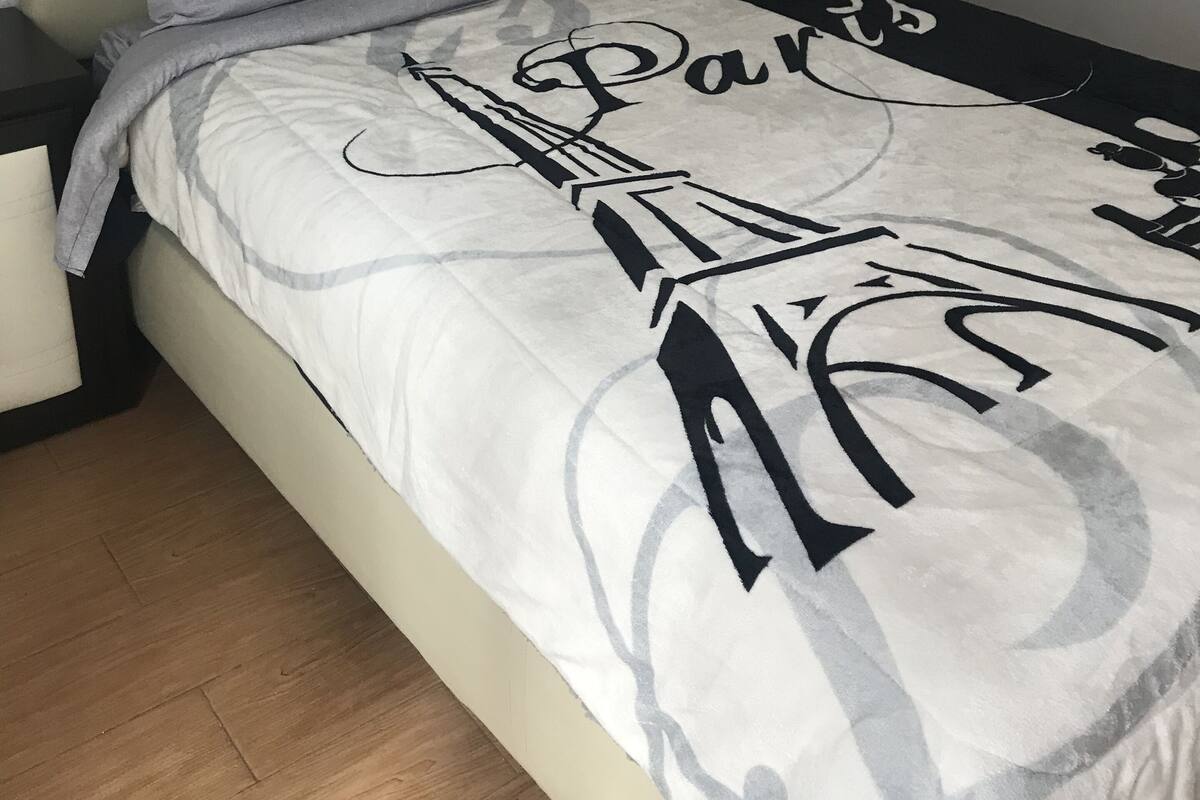 City Room (Room 1) | Premium bedding, desk, laptop workspace, iron/ironing board (on request)