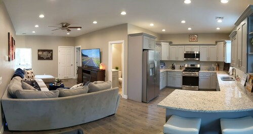 Family friendly 4 bedroom townhome with attached 2 car garage & summertime A/C!