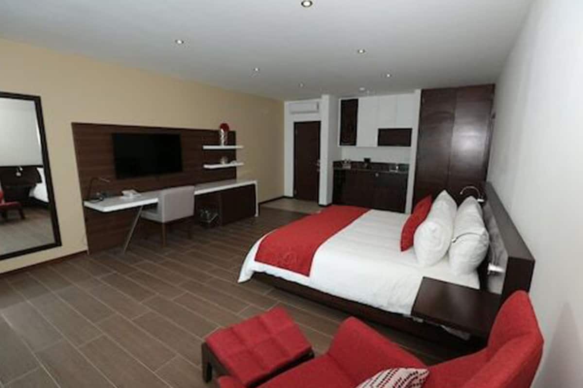 Habitación junior | 1 dormitorio, minibar, caja fuerte y decoración individual