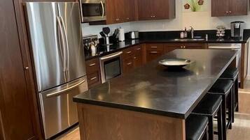 Coffee/tea maker, fridge, microwave, oven