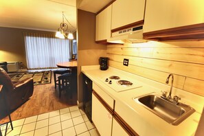 Microwave, coffee/tea maker, toaster, cookware/dishes/utensils