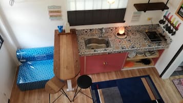 Fridge, electric kettle, cookware/dishes/utensils, spices
