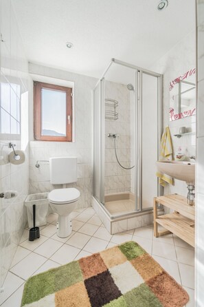 Casa exclusiva | Banheiro | Chuveiro, secador de cabelo, toalhas de banho, sabonete