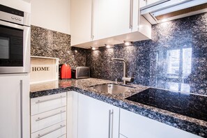 Fridge, microwave - App. Ottsen - Directly opposite the "Sylter Welle" in the Haus At app. Ottsen - Directly opposite the (Sylt)