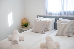 4 slaapkamers, geluiddichte muren, een strijkplank/strijkijzer