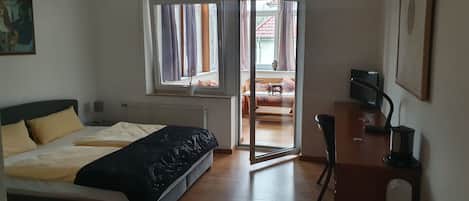 Double Room, Non Smoking | Minibar, individually furnished, desk, laptop workspace