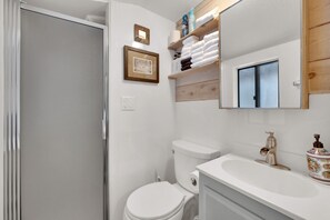 Hair dryer, towels, soap, shampoo