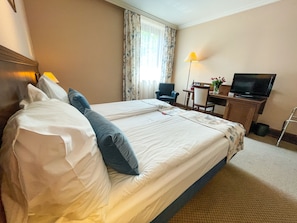 Deluxe Room (King-bed) | In-room safe, desk, laptop workspace, soundproofing