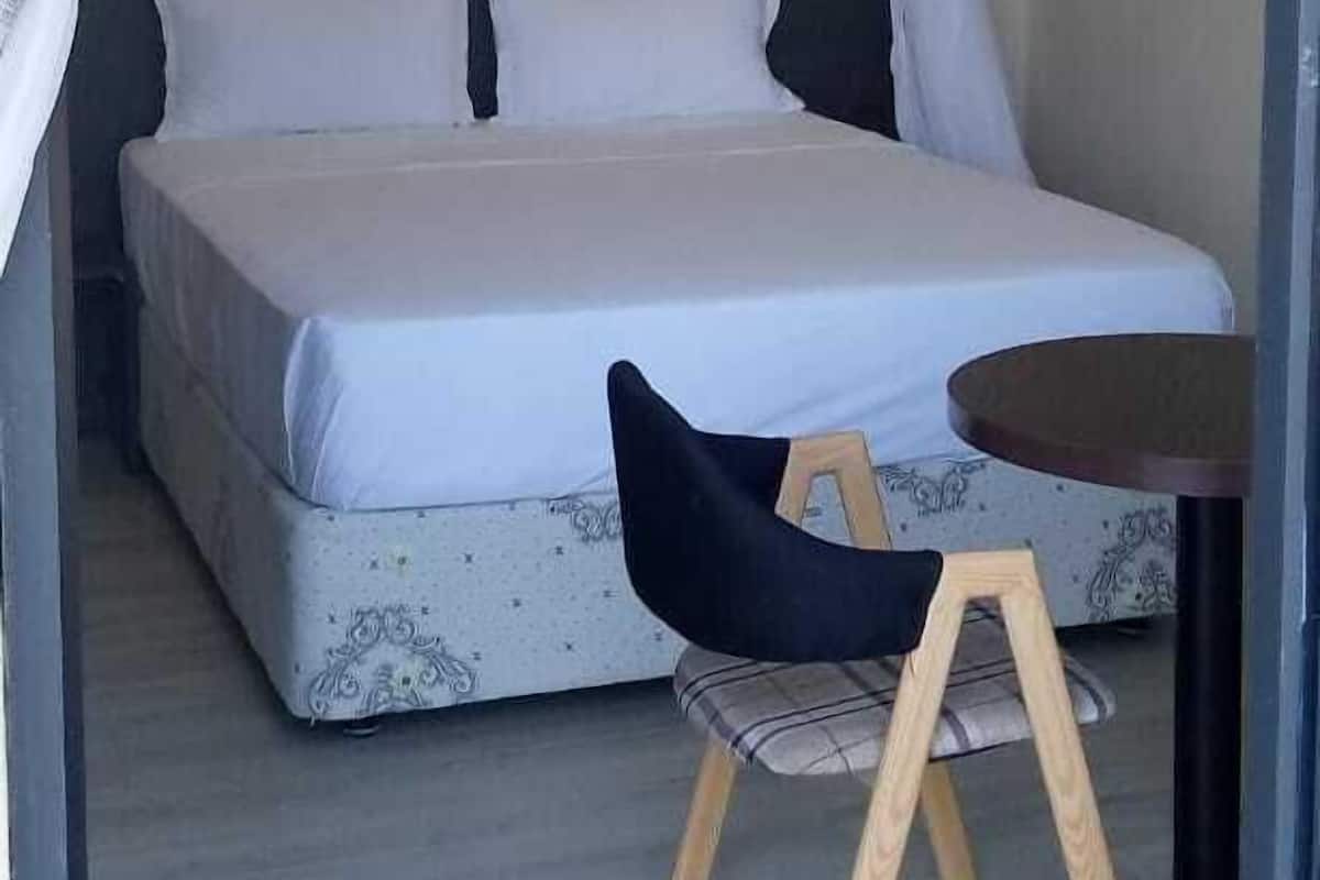 Habitación doble Deluxe | 1 habitación, minibar, cortinas blackout y camas extra