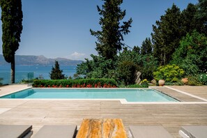 Outdoor pool, a heated pool, pool loungers