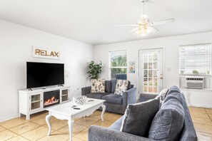 Smart TV, fireplace, DVD player, books