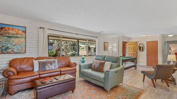 Smart TV, fireplace, table tennis, books