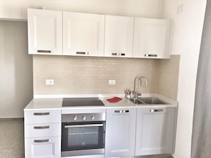 Refrigerador, horno, placa de cocina, lavavajillas