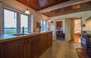 Réfrigérateur, plaque de cuisson, cafetiÚre/bouilloire