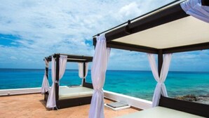 A beachside cabana with a view of the ocean. - Amazing Ocean Views (Cozumel)