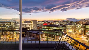 A modern urban cityscape at dusk with contemporary buildings and a clear sky. - The Muse Christchurch, Art Hotel (Christchurch)