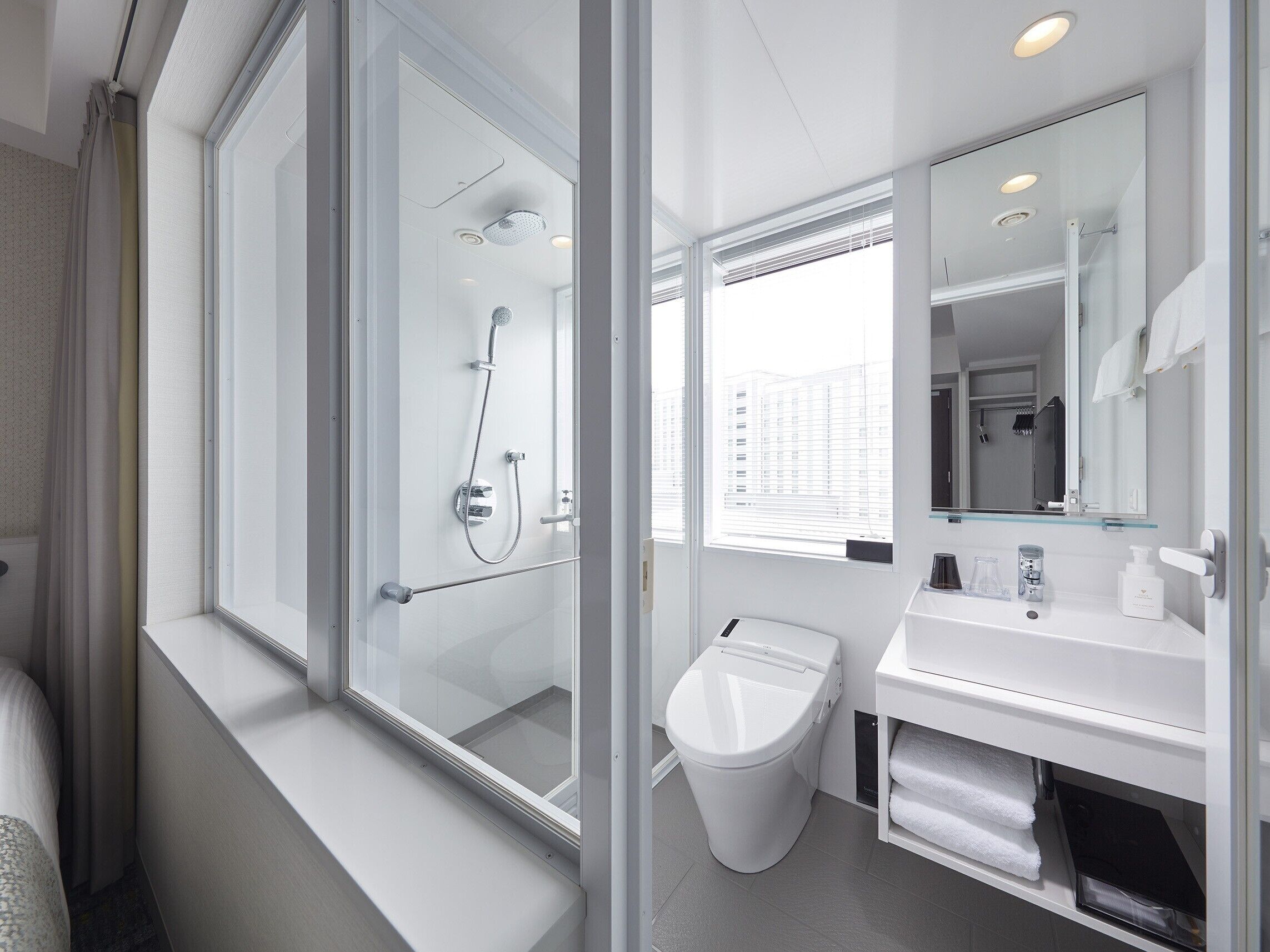 free toiletries, hair dryer, slippers, bidet