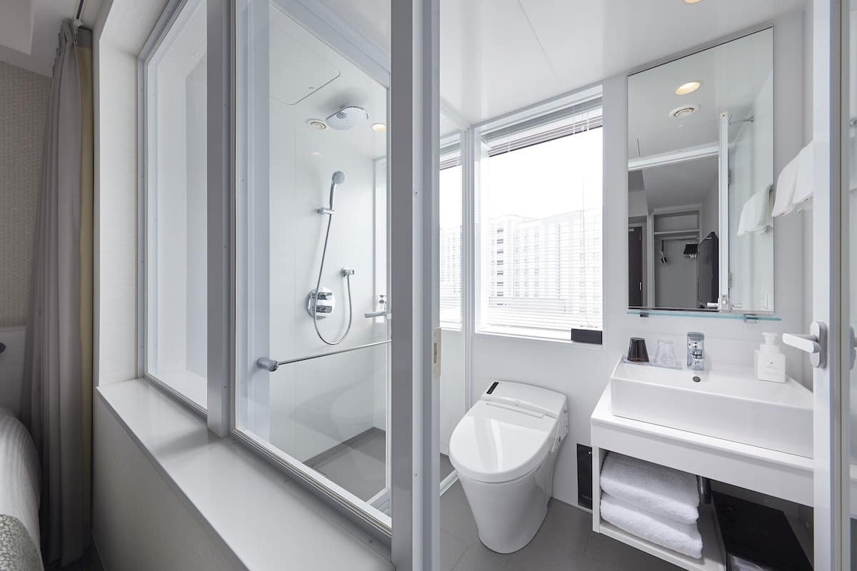 free toiletries, hair dryer, slippers, bidet