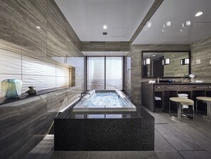 Combined shower/tub, free toiletries, hair dryer, bathrobes