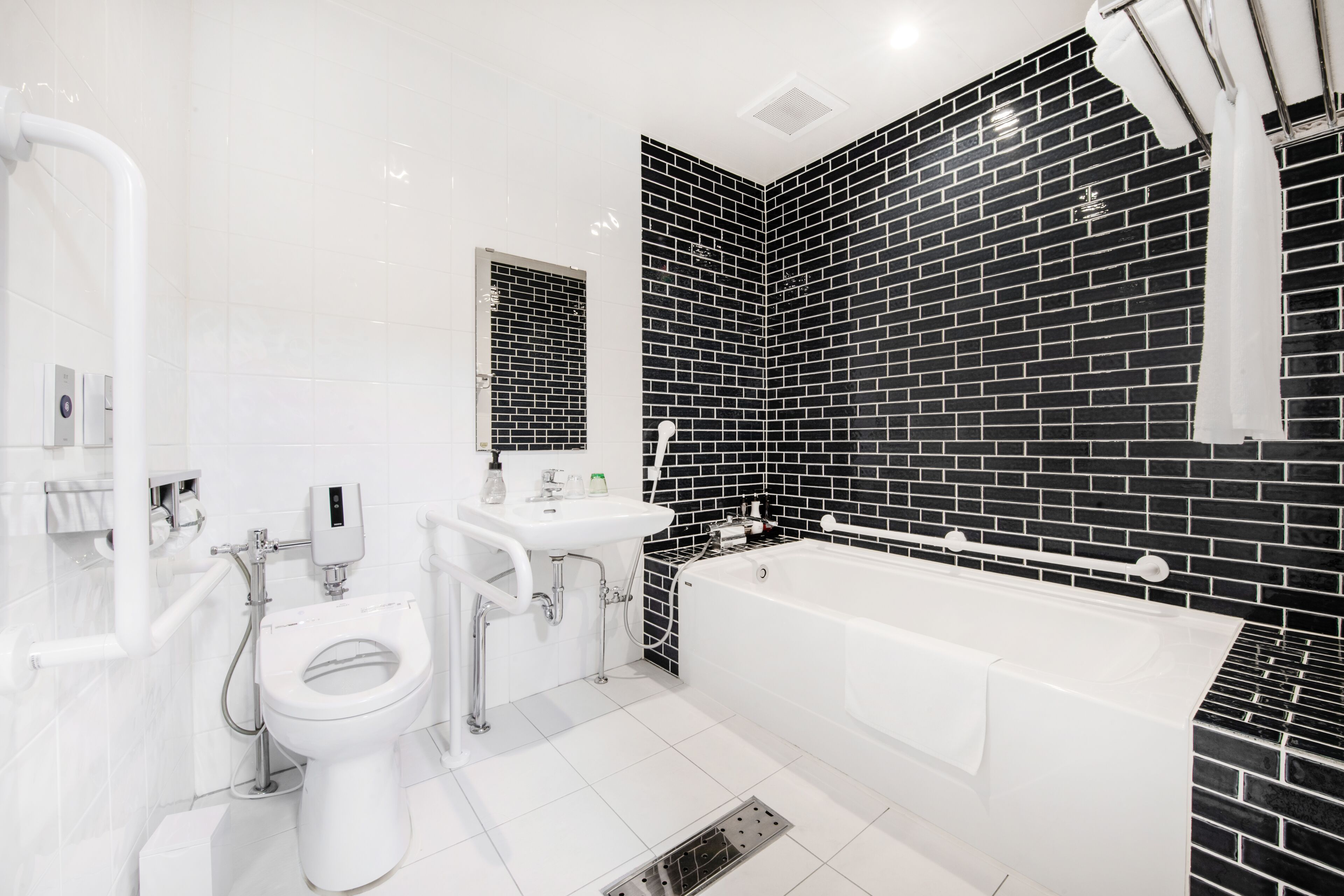 separate bathtub and shower, free toiletries, hair dryer, slippers