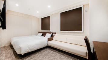 Triple Room | Down comforters, desk, laptop workspace, blackout drapes