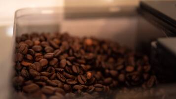 A container filled with coffee beans.