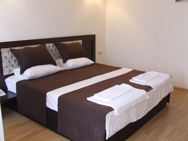 スタンダード コテージ | 1 室のベッドルーム、高級寝具、羽毛の掛け布団、ミニバー