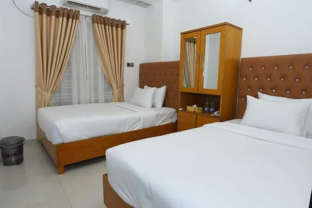 business double or twin room, 2 bedrooms, golf view | minibar, in-room safe, desk, laptop workspace