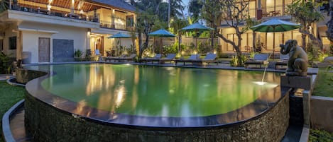 Outdoor pool, open 7:00 AM to 7:00 PM, pool umbrellas, sun loungers
