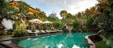 Outdoor pool, open 7:00 AM to 7:00 PM, pool umbrellas, sun loungers