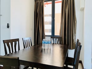 In-room dining - D'wharf Residence PD Waterfront Family Premier Suite by AirPlan (Port Dickson)