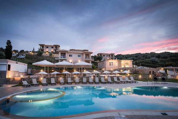 Outdoor pool, open 8:30 AM to 8:30 PM, pool umbrellas, pool loungers