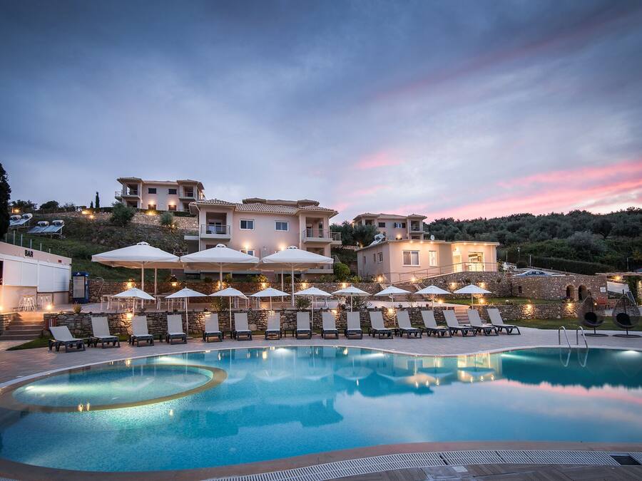 Outdoor pool, open 8:30 AM to 8:30 PM, pool umbrellas, pool loungers