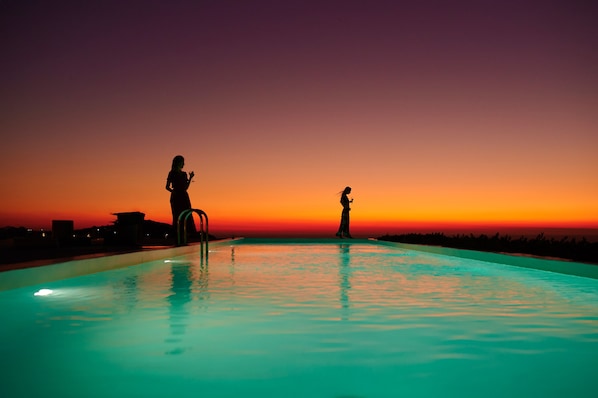 Outdoor pool, pool umbrellas, pool loungers