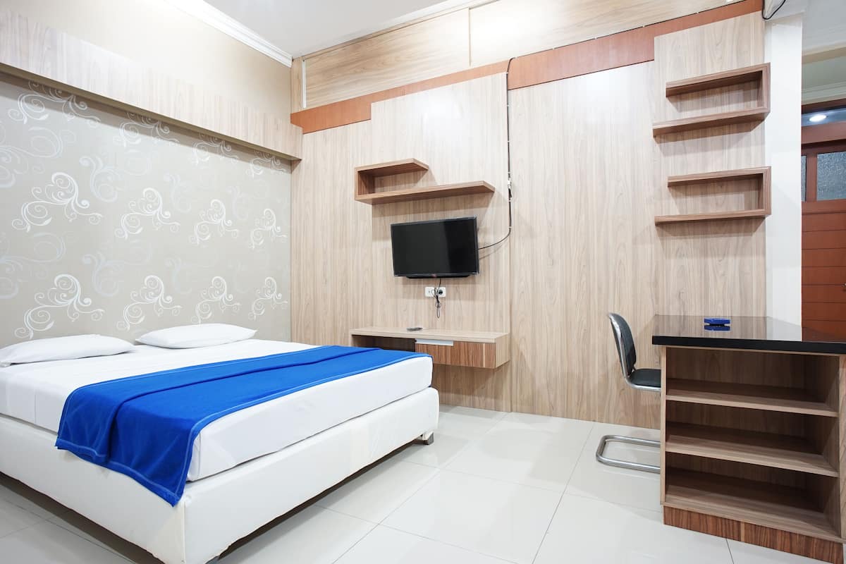 Suite familiar | 1 dormitorio, escritorio, wifi gratis y ropa de cama
