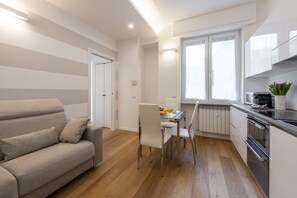 Apartment, 1 Bedroom | Living area | 32-inch flat-screen TV with digital channels, TV - BnButler - Friuli 24 (Milan)