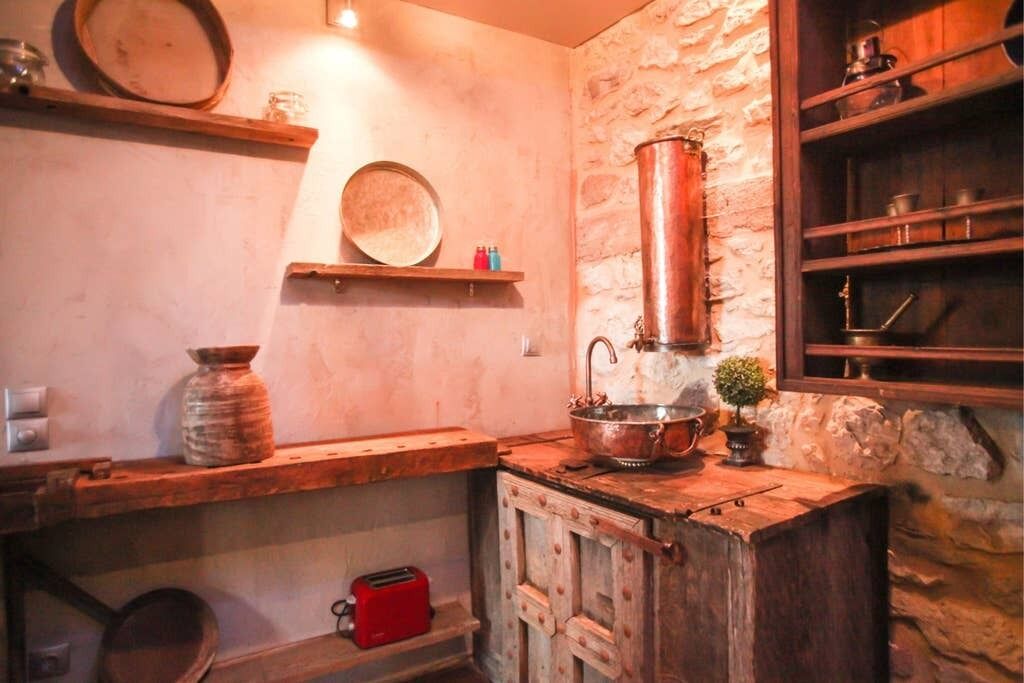 Apartment | Private kitchenette | Fridge, stovetop, electric kettle, cookware/dishes/utensils