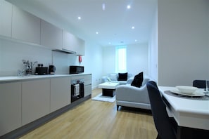 Apartment | Living area | 32-inch flat-screen TV with digital channels, TV