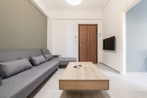 Apartamento | Área de estar | TV de tela plana