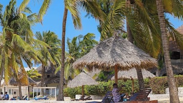 On the beach, white sand