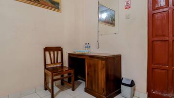 Habitación triple Deluxe | Zona de estar