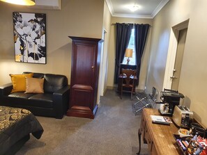 Family Room | Free minibar items, individually decorated, individually furnished, desk