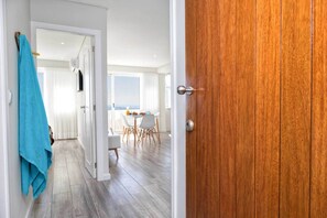 Apartment, 1 Bedroom, River View | Living room | Flat-screen TV