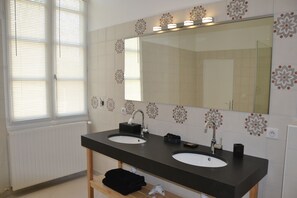 Shower, hair dryer, towels, toilet paper