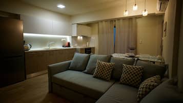 公寓, 海景 (1 Double Bed + 1 Sofa Double Bed) | 客廳 | 平面電視、收費電影、串流服務